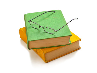 Glasses and two books