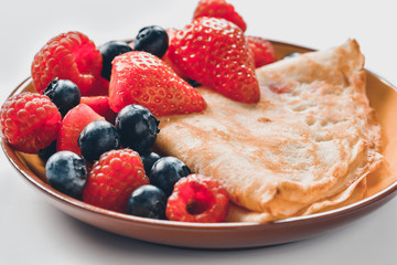 Pancake with summer fruits. Crepe, berries.