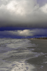 Dark sky and Baltic sea.