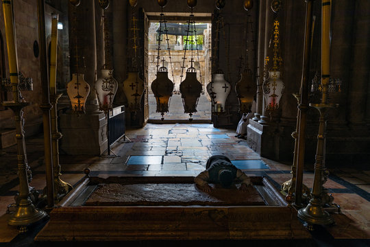 Worship at the Stone of Anointing in Church of the Holy Sepulchre in Jerusalem