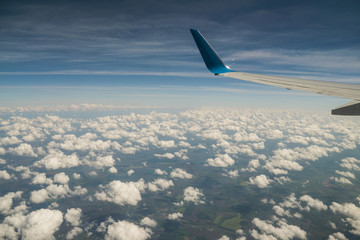 Obraz premium Aerial view of sky from aircraft window.