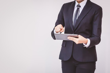 Young businesswoman using tablet