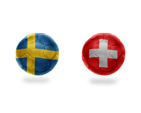 football balls with national flags of sweden and switzerland.