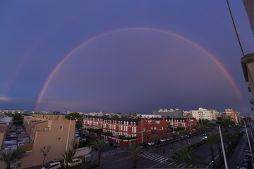 Double rainbow over the sky of the city of Elche in Spain.