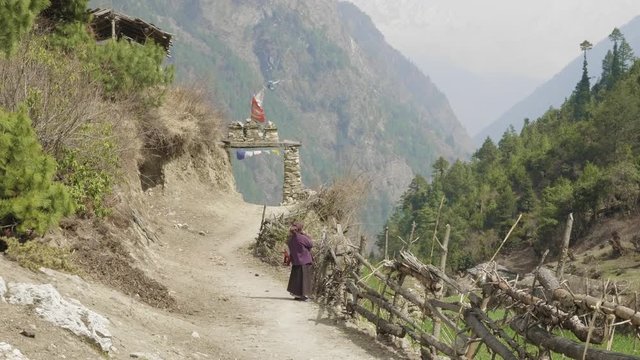 Arch to nepalese village Lho. Manaslu circuit trek.