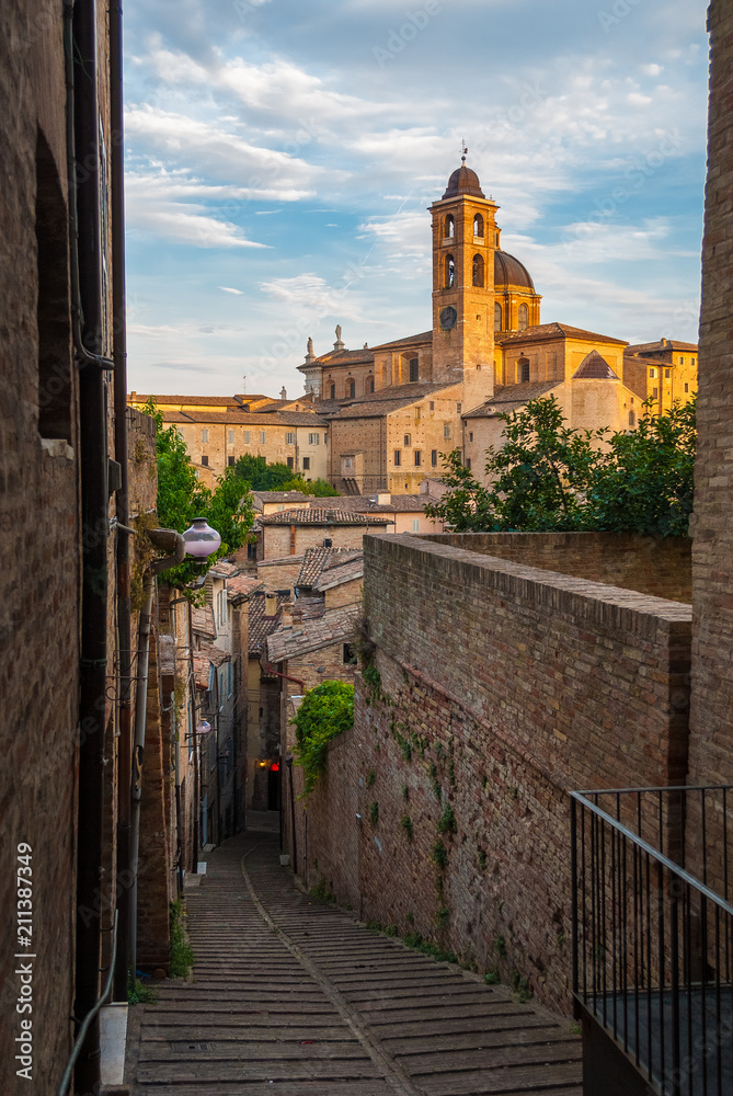 Wall mural Narrow alley in the city center of Urbino