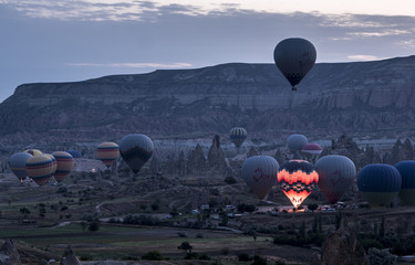 The great tourist attraction of Cappadocia - balloon flight on Sunrise. Cappadocia is known around...