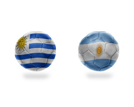 football balls with national flags of argentina and uruguay.