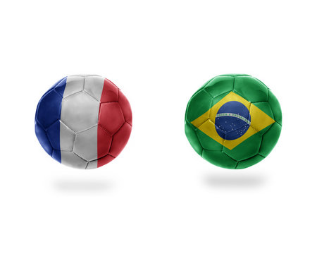 football balls with national flags of brazil and france.