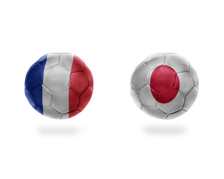 football balls with national flags of japan and france.