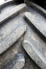 Close-up of dirty tractor tire as background