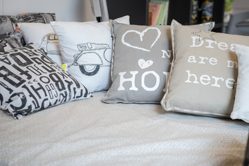 Sofa with colorful pillows in the room