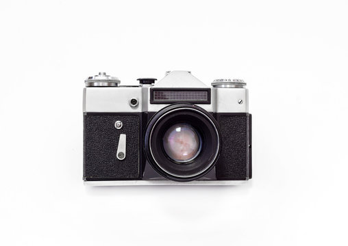 Vintage film camera, close-up on a white background, top view
