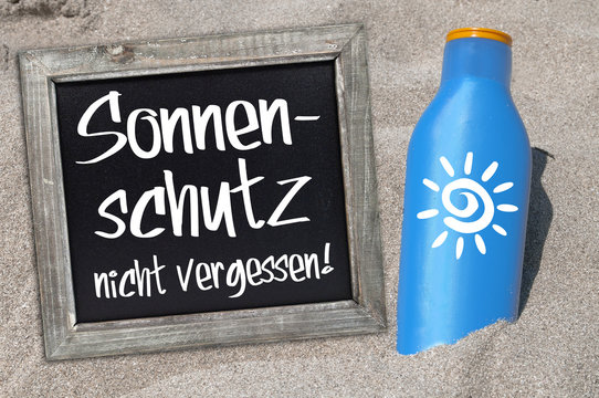 Sonnencreme Sonnenmilch UV-Schutz im Sand Tafel Sonnenschutz