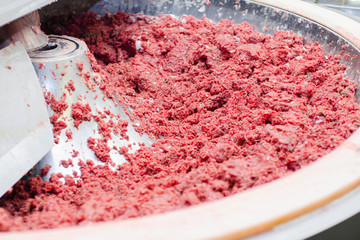 Cutter for grinding meat. Sausage production line. Process of sausage manufacturing. Industrial...