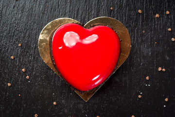 Heart shaped red velvet cake with chocolate
