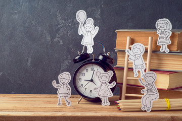 Back to school concept with small children doodles