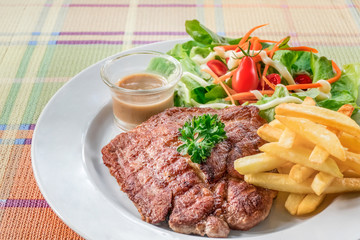 Grilled steak on dish