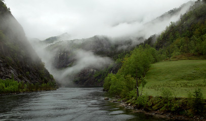 Low clouds in the fjord of Bergen in Norway