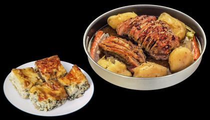 Pork Ham Slices Oven Baked with Whole Potatoes Served with Cheese and Spinach Pie Isolated on Black Background