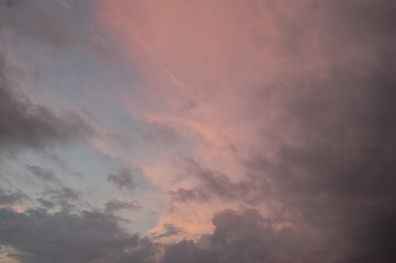 Fototapeta na wymiar Pink and gray clouds