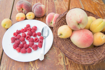 variety of fresh fruits. On a wooden table
