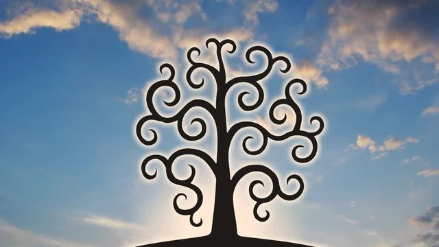 Tree of life against the background of the sun and clouds. Video contemplating the plot.