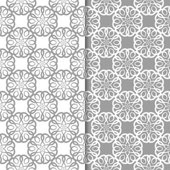 White and gray set of floral backgrounds. Seamless patterns