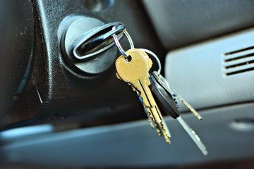 Closeup of keys dangling from a car ignition