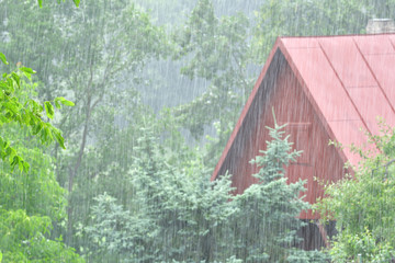 cold rainy weather in summer on holiday cottage
