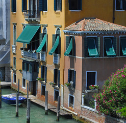 Beautiful architecture  Venice, Italy. Details of the windows and doors of the colorful houses. Street. Grand canal famous landmark panoramic view Venice Italy with blue sky white cloud.