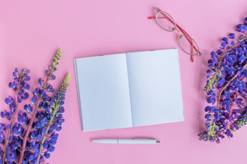 Mockup notebook with lupine flower