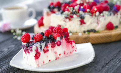 cheese cake and tea on a wooden background