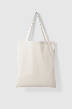 Blank Tote Canvas Bag Mockup hanging on a wall. High resolution. 