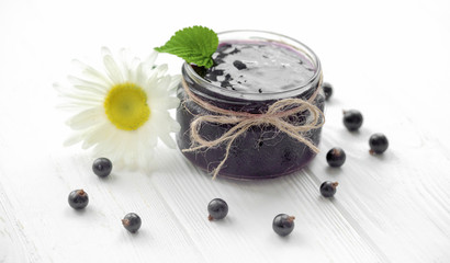 jam with currant on white background