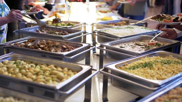 people group catering buffet food indoor in luxury restaurant with meat colorful fruits and vegetables.