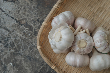 Garlic bulb with rustic background