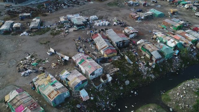 Aerial drone shot of neglected Roma minority camp, poverty in temporary settlement in Albania, Southeastern Europe