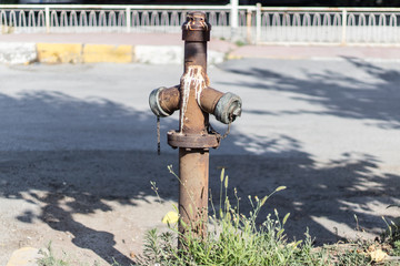 an old water hydrant - dim colored