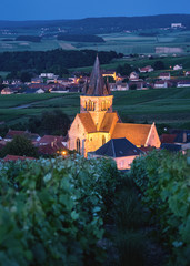 Illuminated walls of Sacy church between the vineyards near Reims, France - 211415599