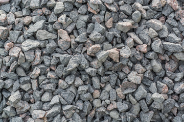 Stones from gray and red granite
