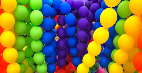 Colorful balloons background. Rainbow color balloons put together.
