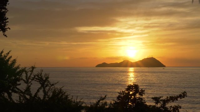 Sundown over the island of Mararison or Malalison in the Philippines