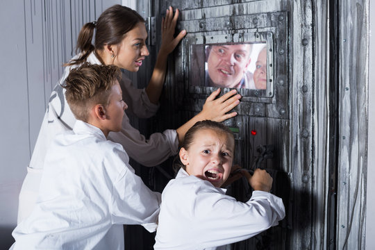 Family is helping dad and girl get out of the locked door