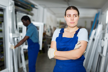 Portrait of sad woman worker who is standing