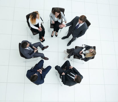 top view of business team discussing new ideas.