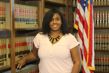 Portrait of a young attractive African American woman, portrait of a woman lawyer. 