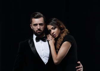 fashion studio photo of beautiful couple in elegant clothes