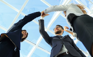 Successful business people handshaking closing a deal