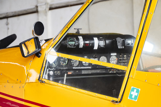 Closeup view of Zlin Z-37 Cmelak agricultural airplane cockpit from outside made in Czechoslovakia.